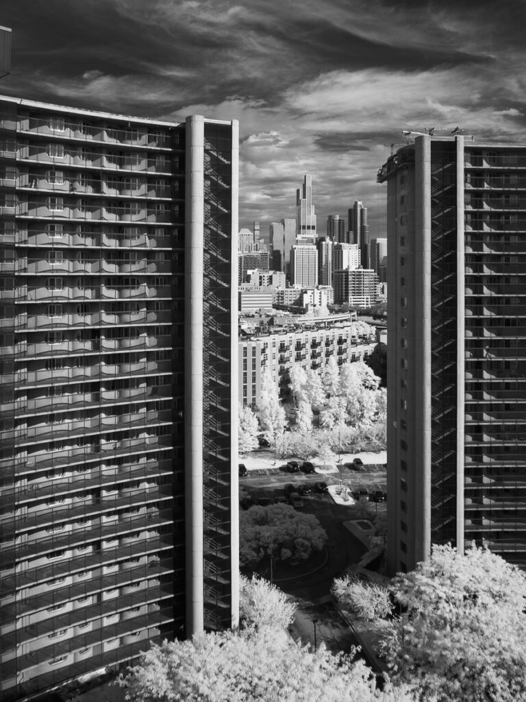 Between the residential towers.